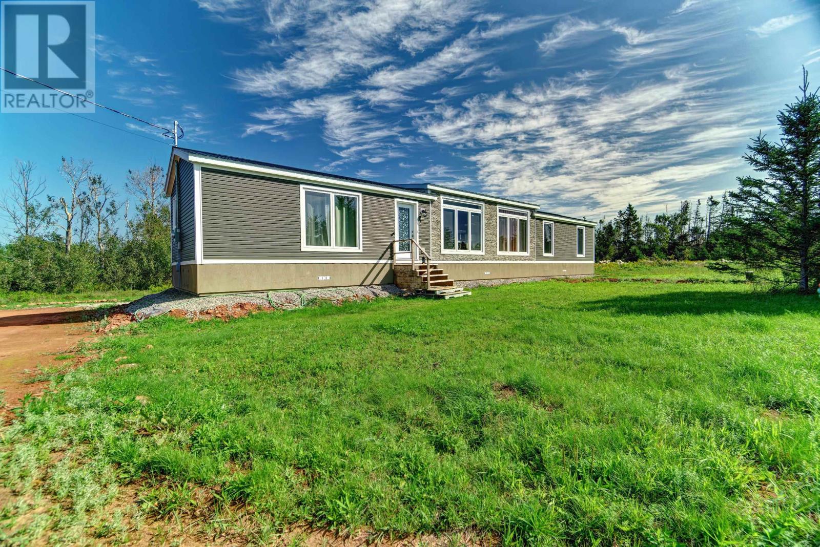 62 Tamarack Drive, Grand Tracadie, Prince Edward Island  C0A 1T0 - Photo 1 - 202428175